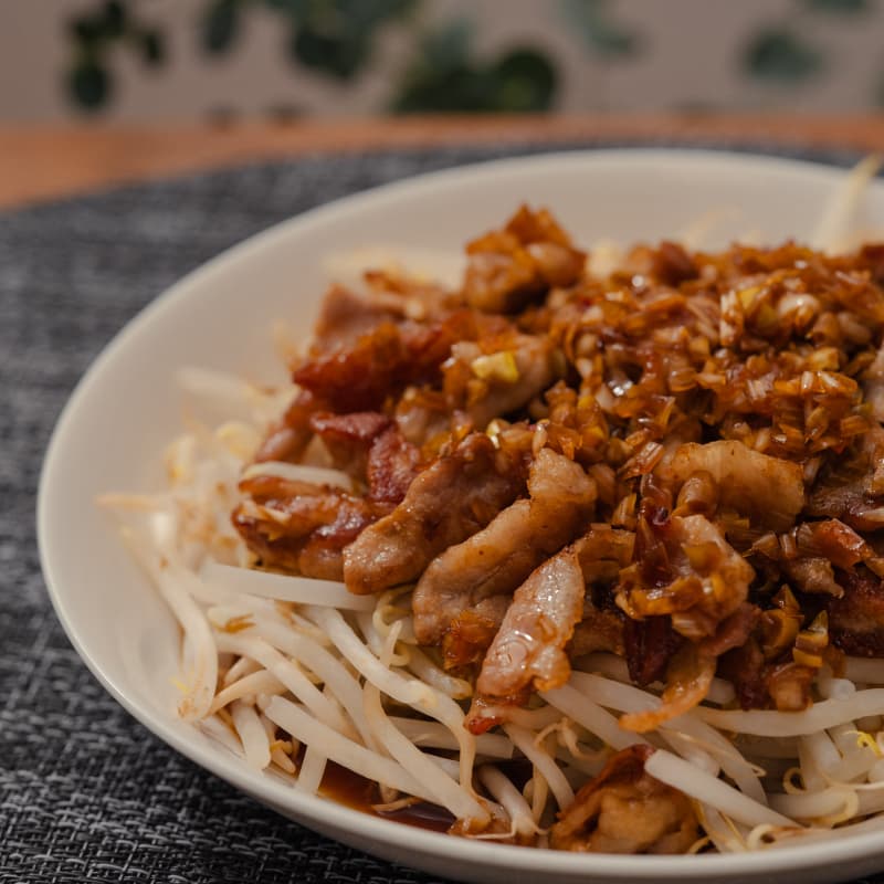 豚こまのカリカリ焼の甘酢ネギダレがけ